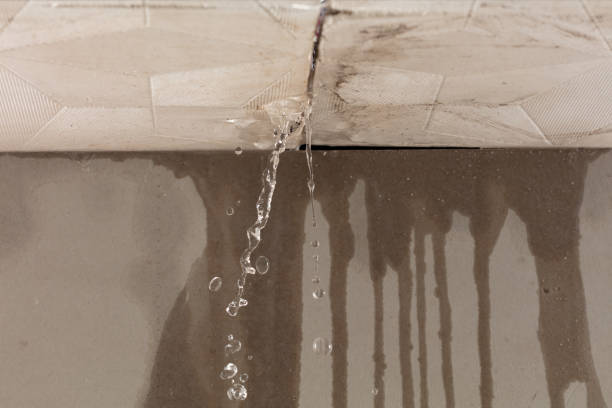 Professional Burst Pipe Cleanup technician working in Santa Clara, NM